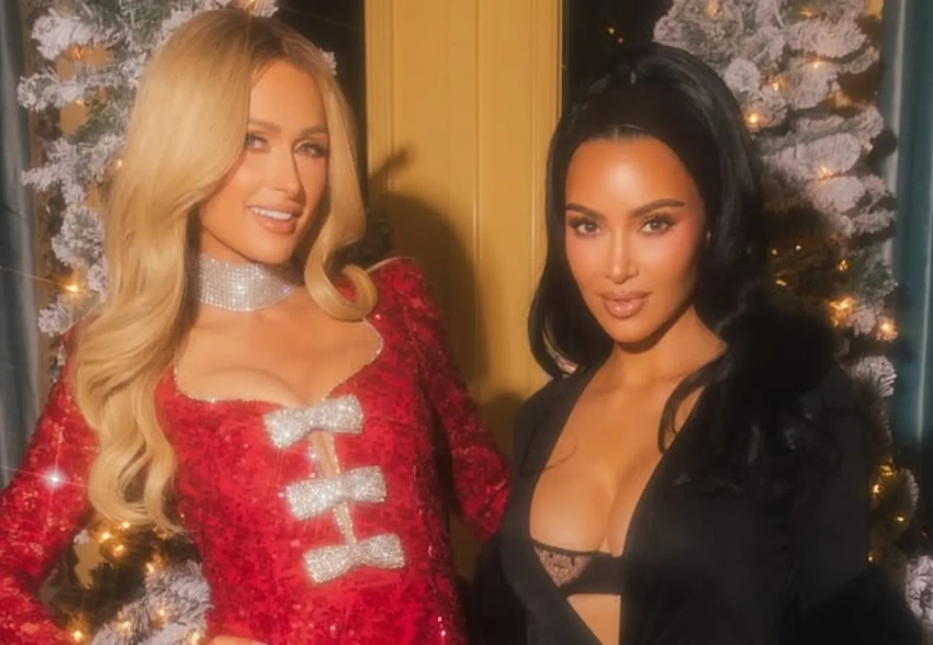 Кристен Стюарт, Ким Кардашьян (с декольте), Эмма Робертс и Пэрис Хилтон на рождественской вечеринке в Лос-Анджелесе